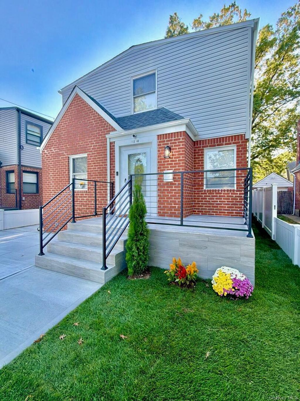 Photo of 113-40 198th St, Saint Albans, NY 11412 (MLS # 924786)