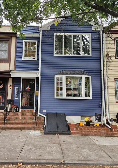 Photo of 7852 79th Lane, Glendale, NY 11385 (MLS # 924038)