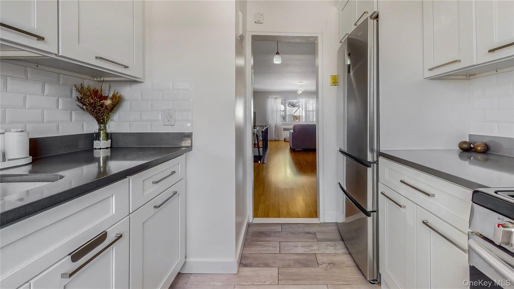 Photo of 198-18 Pompeii Avenue #2, Hollis, NY 11423 (MLS # 958135)