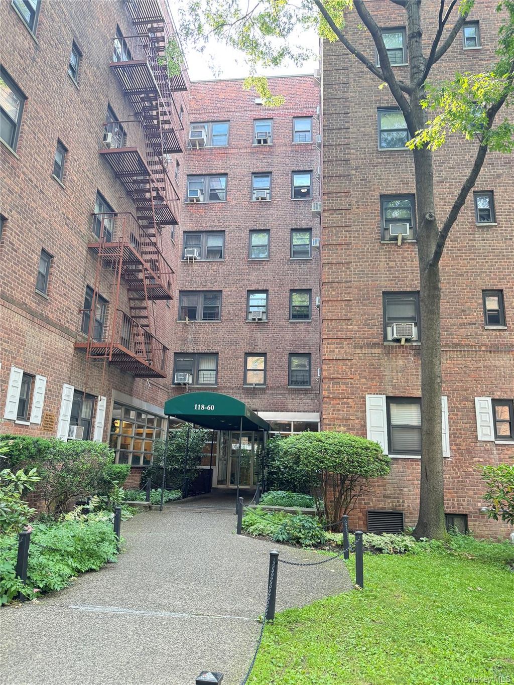Photo of 118-60 Metropolitan Avenue #1J, Kew Gardens, NY 11415 (MLS # 1013170)