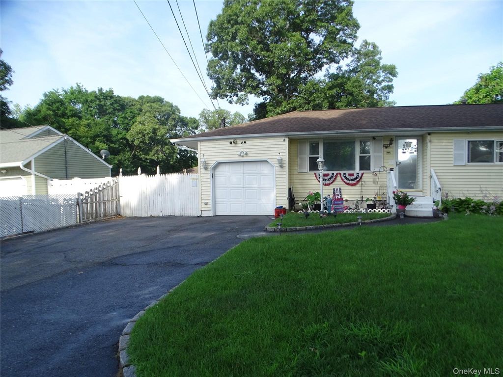 Photo of 22 Newtown Avenue, Selden, NY 11784 (MLS # 1026104)