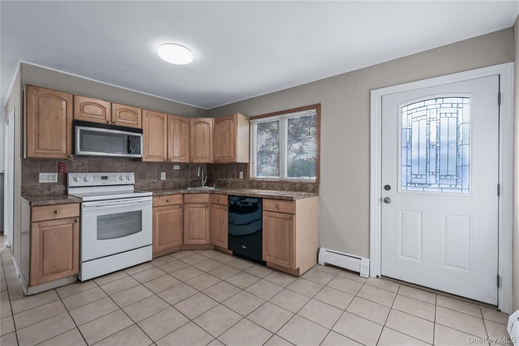 Photo of 71 Chimney Lane, Levittown, NY 11756 (MLS # 921052)