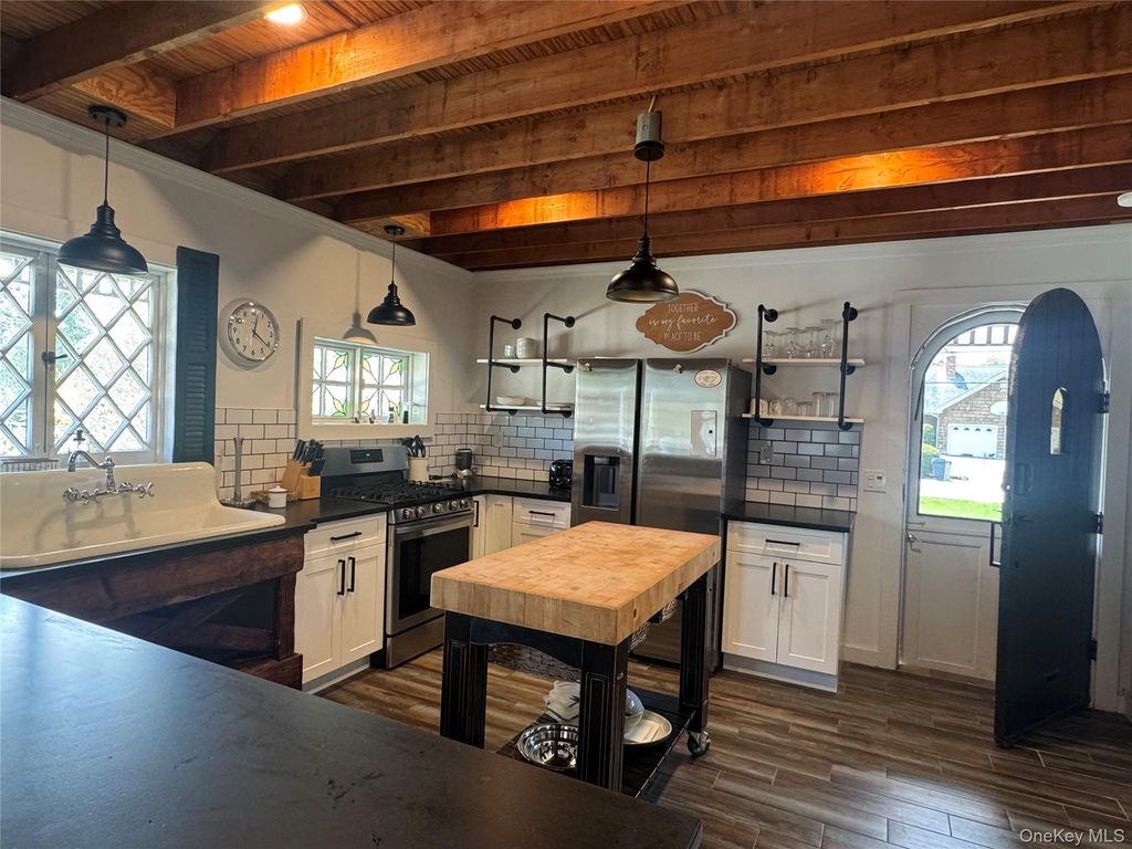 Photo of 12 Herricks Lane, Jamesport, NY 11901 (MLS # 985572)