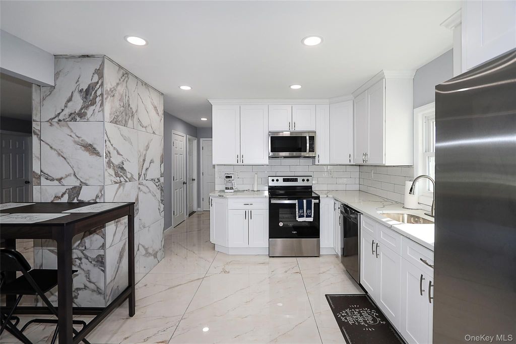 Photo of 17 Windmill Lane, Levittown, NY 11756 (MLS # 941398)