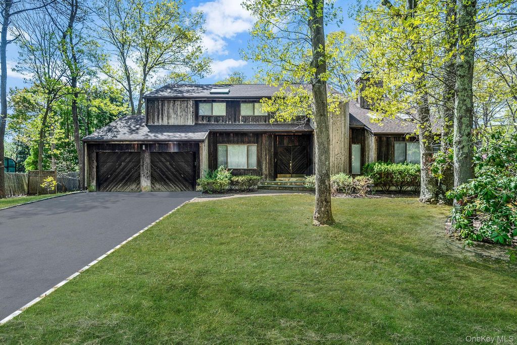 Photo of 10 Lily Drive, South Setauket, NY 11720 (MLS # 995561)