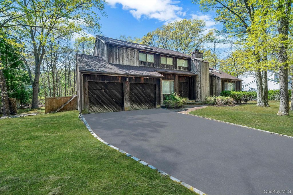 Photo of 10 Lily Drive, South Setauket, NY 11720 (MLS # 995561)