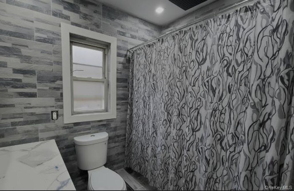 Photo of 3228 Utopia Parkway, Flushing, NY 11358 (MLS # 951026)