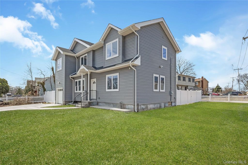 Photo of 1078 Woodfield Road, Rockville Centre, NY 11570 (MLS # 979539)