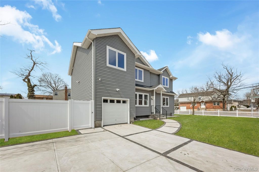 Photo of 1078 Woodfield Road, Rockville Centre, NY 11570 (MLS # 979539)