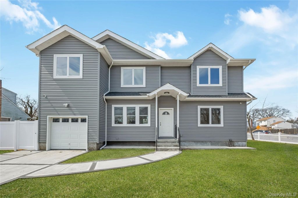 Photo of 1078 Woodfield Road, Rockville Centre, NY 11570 (MLS # 979539)