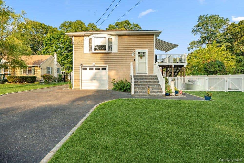 Photo of 107 Avenue A, Holbrook, NY 11741 (MLS # 1038516)