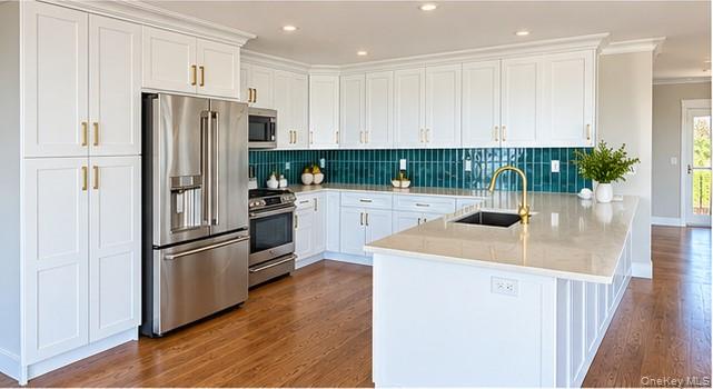 Photo of 71 E Shore Drive, Babylon, NY 11702 (MLS # 1050945)