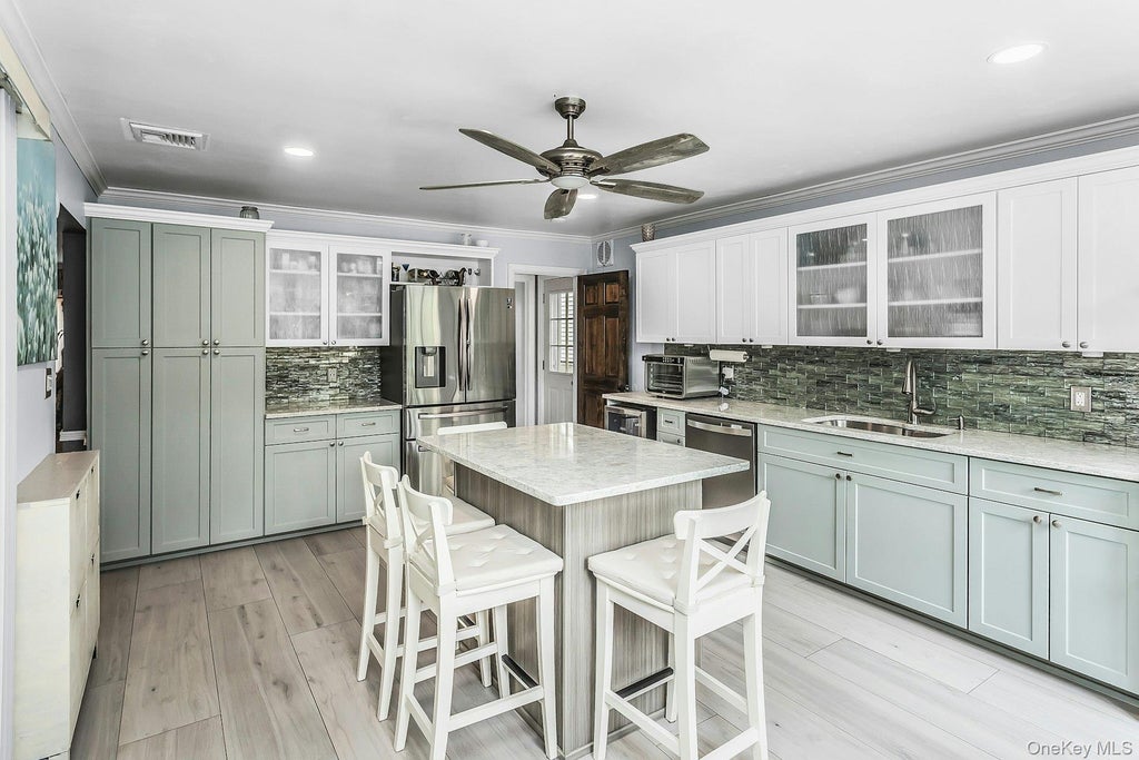 Photo of 1491 sycamore Avenue, Merrick, NY 11566 (MLS # 1032596)