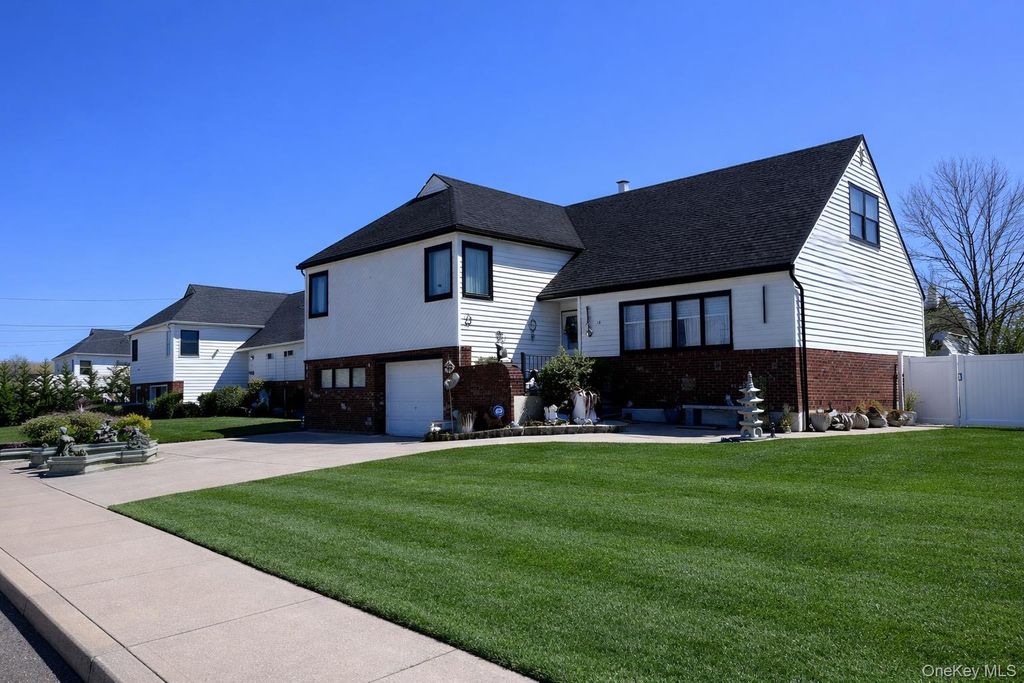 Photo of 13 Noon Place, Freeport, NY 11520 (MLS # 983788)