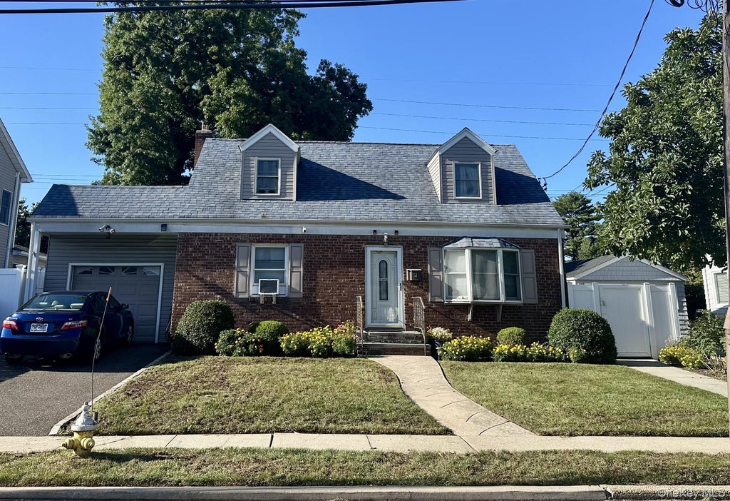 Photo of 15 Lexington Avenue, Westbury, NY 11590 (MLS # 1050641)