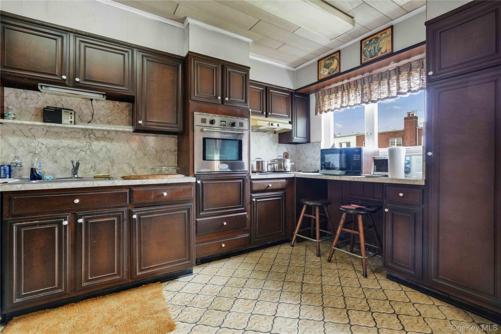 Photo of 59-37A 69th Lane, Maspeth, NY 11378 (MLS # 1017381)