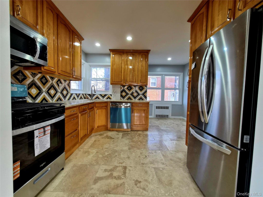 Photo of 8019 UTOPIA Parkway, Jamaica Estates, NY 11432 (MLS # 1054748)