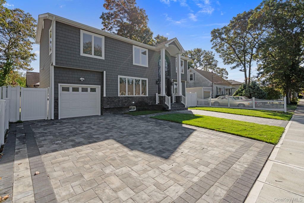 Photo of 33 6th Avenue, Massapequa Park, NY 11762 (MLS # 927652)