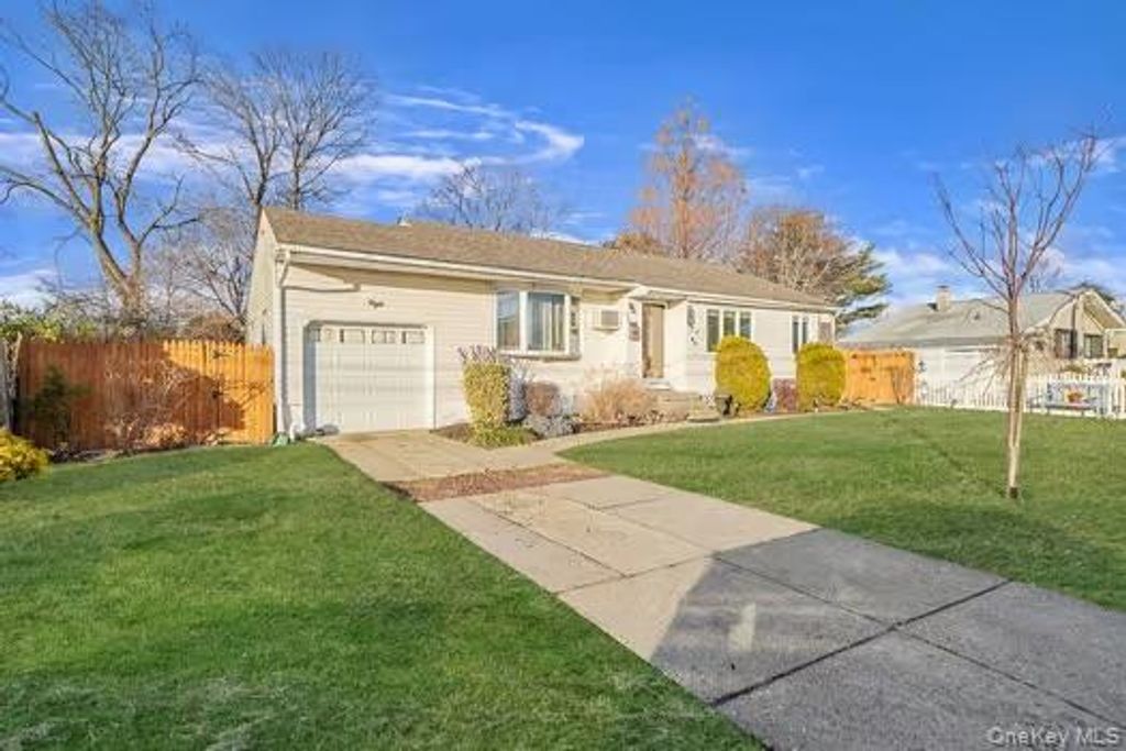 Photo of 13 Hewes Street, Brentwood, NY 11717 (MLS # 951504)