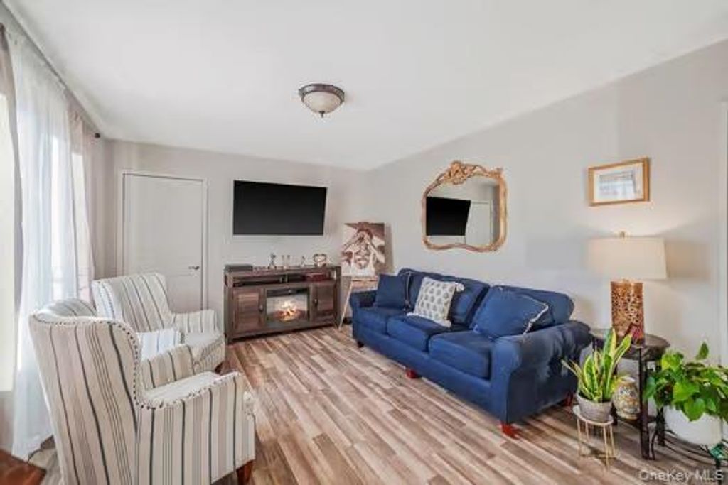 Photo of 13 Hewes Street, Brentwood, NY 11717 (MLS # 951504)