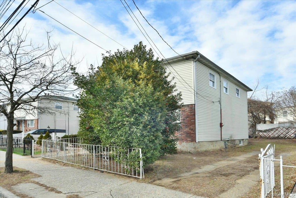Photo of 176-17 127 Avenue, Jamaica, NY 11434 (MLS # 1008603)