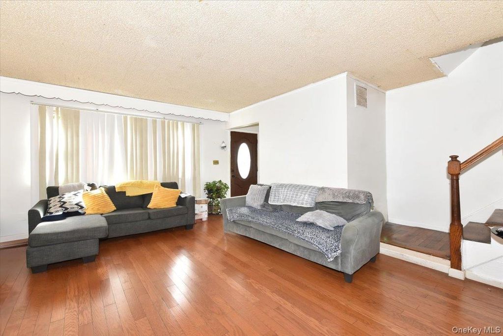 Photo of 176-17 127 Avenue, Jamaica, NY 11434 (MLS # 1008603)