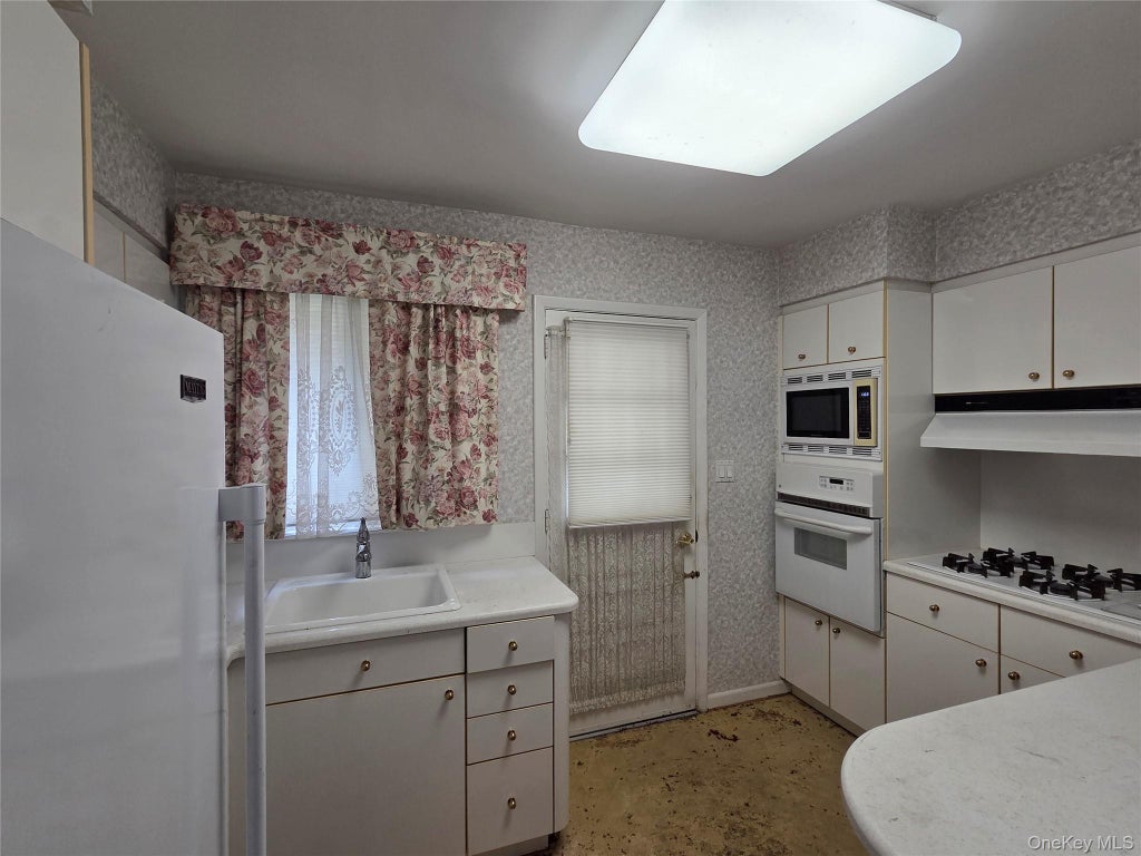 Photo of 42 Sheridan Street, Huntington, NY 11743 (MLS # 1045146)