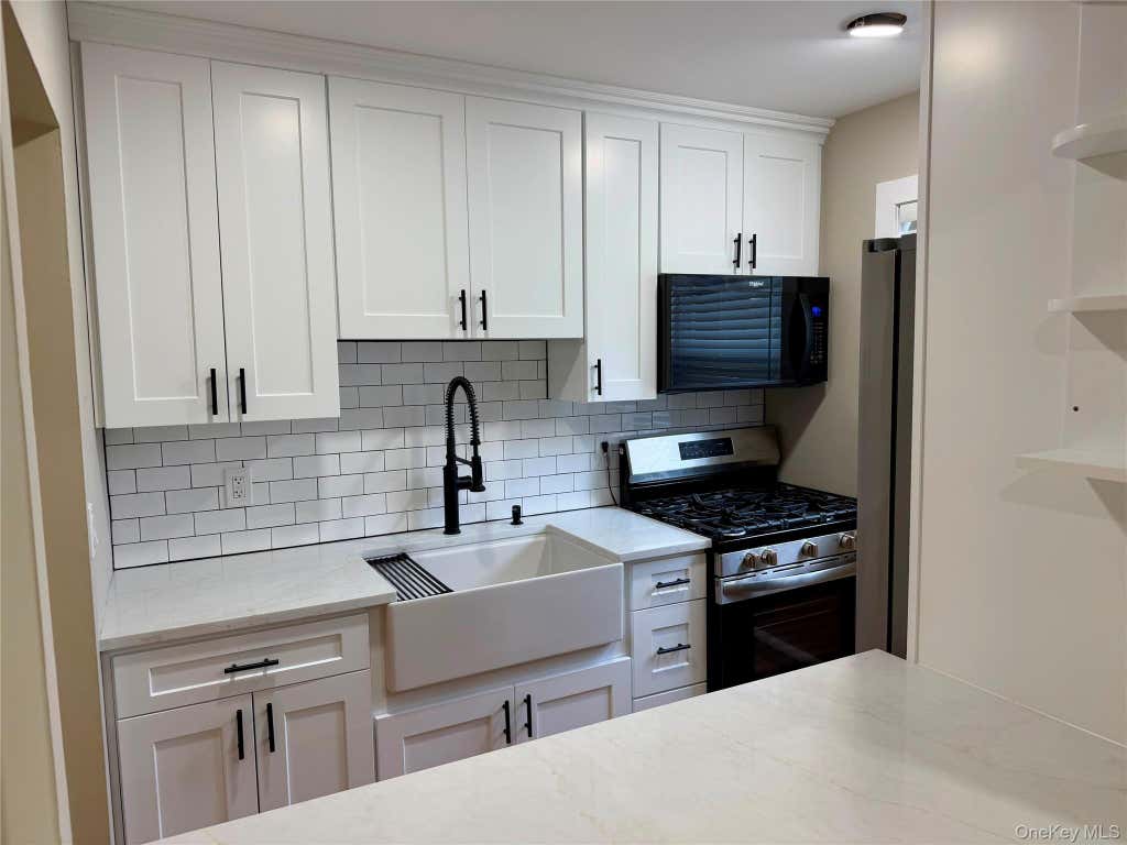 Photo of 57 Adams Road #1B, Central Islip, NY 11722 (MLS # 1040456)
