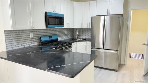 Photo of 9414 CORONA AVE CORONA AVE Ave, Elmhurst, NY 11373 (MLS # 922550)