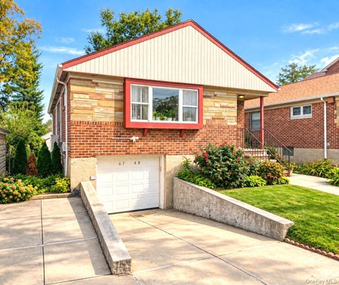 Photo of 67-48 168th Street, Fresh Meadows, NY 11365 (MLS # 1063768)