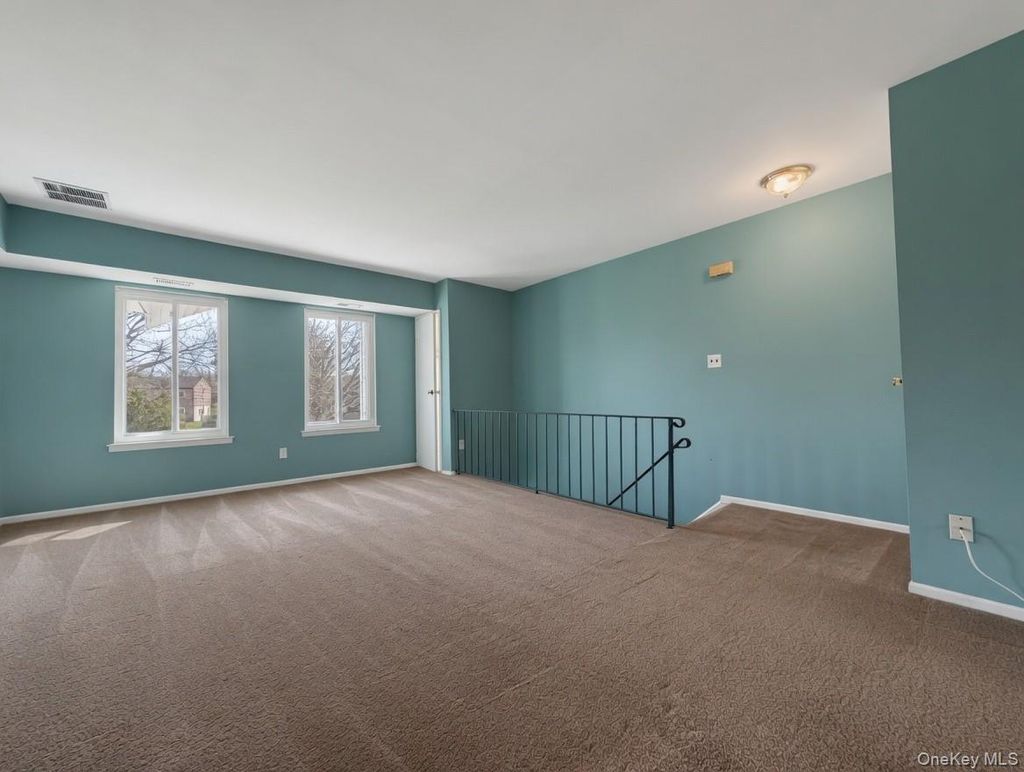 Photo of 8 Redwood Court #8, Coram, NY 11727 (MLS # 988218)