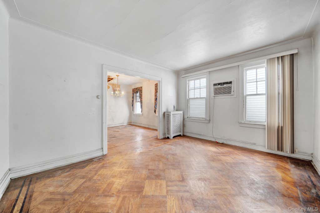 Photo of 61-43 Wetherole Street, Rego Park, NY 11374 (MLS # 1043533)