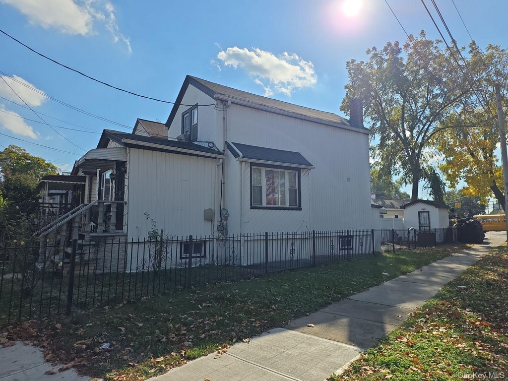 Photo of 140-04 123rd Avenue, Jamaica, NY 11436 (MLS # 944929)