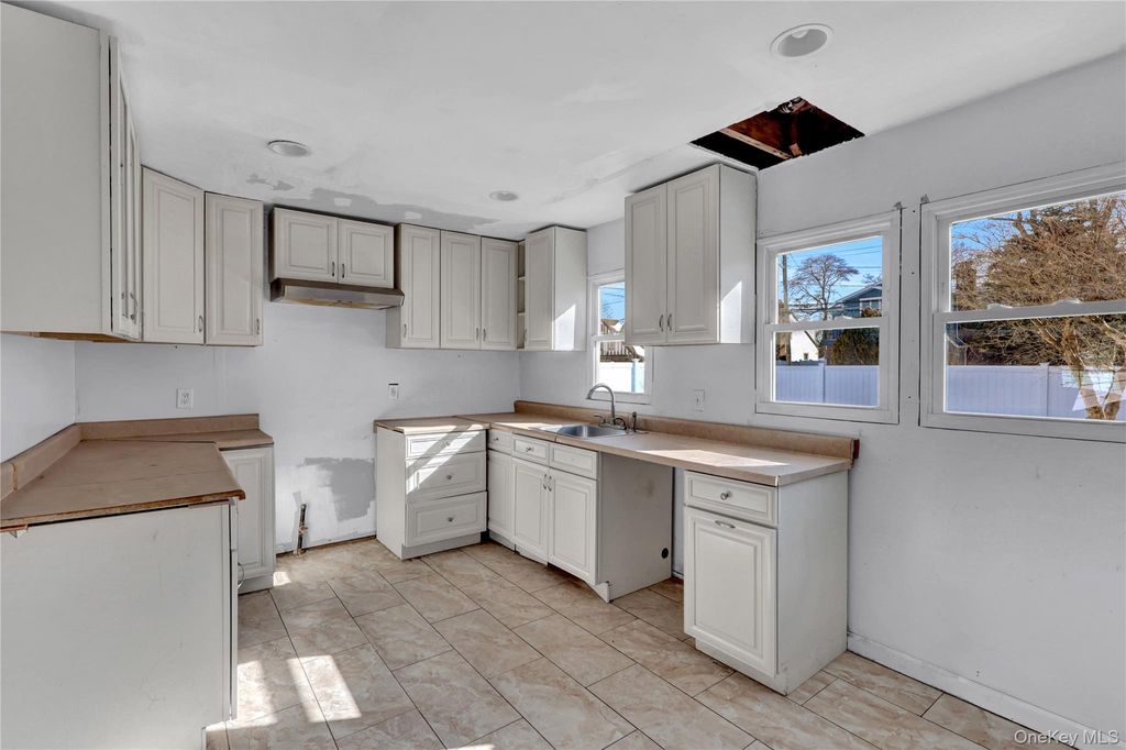 Photo of 1009 Centennial Avenue, North Baldwin, NY 11510 (MLS # 965561)