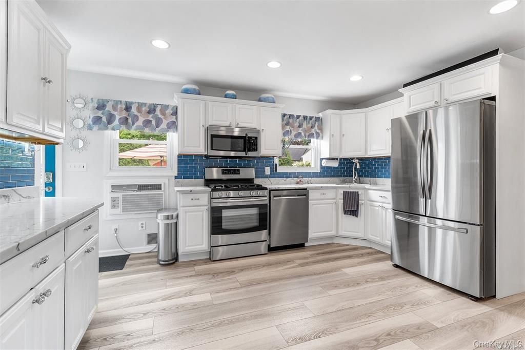 Photo of 71 Hunter Lane, Centereach, NY 11720 (MLS # 953696)