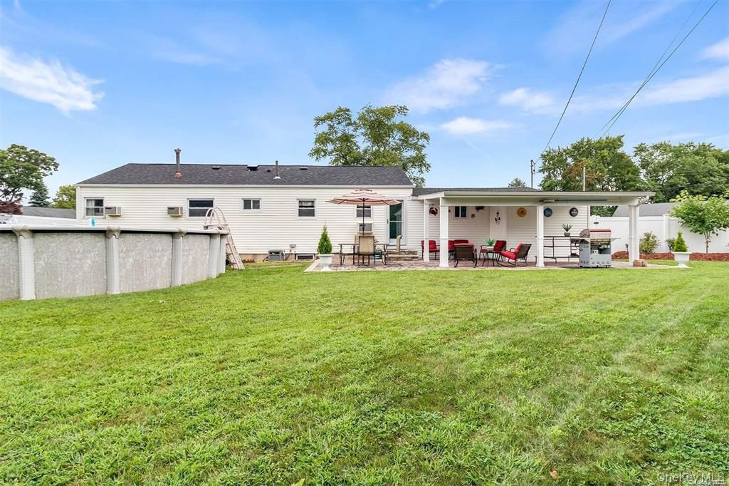 Photo of 71 Hunter Lane, Centereach, NY 11720 (MLS # 953696)