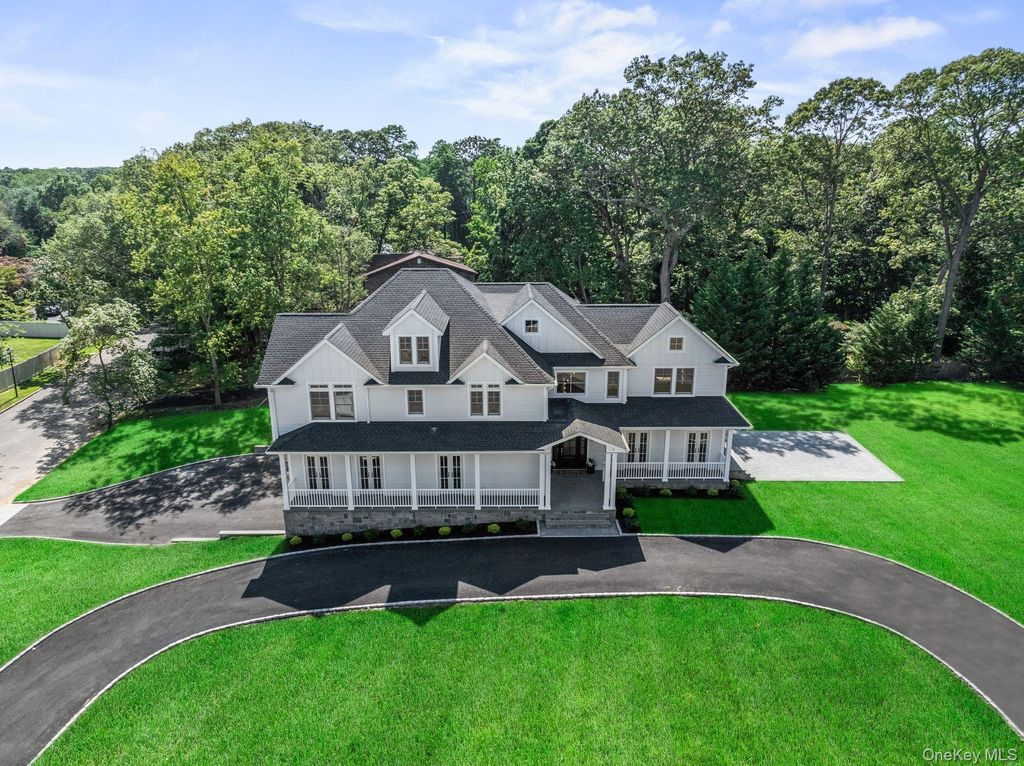 Photo of 10 Threepence Drive, Melville, NY 11747 (MLS # 857547)