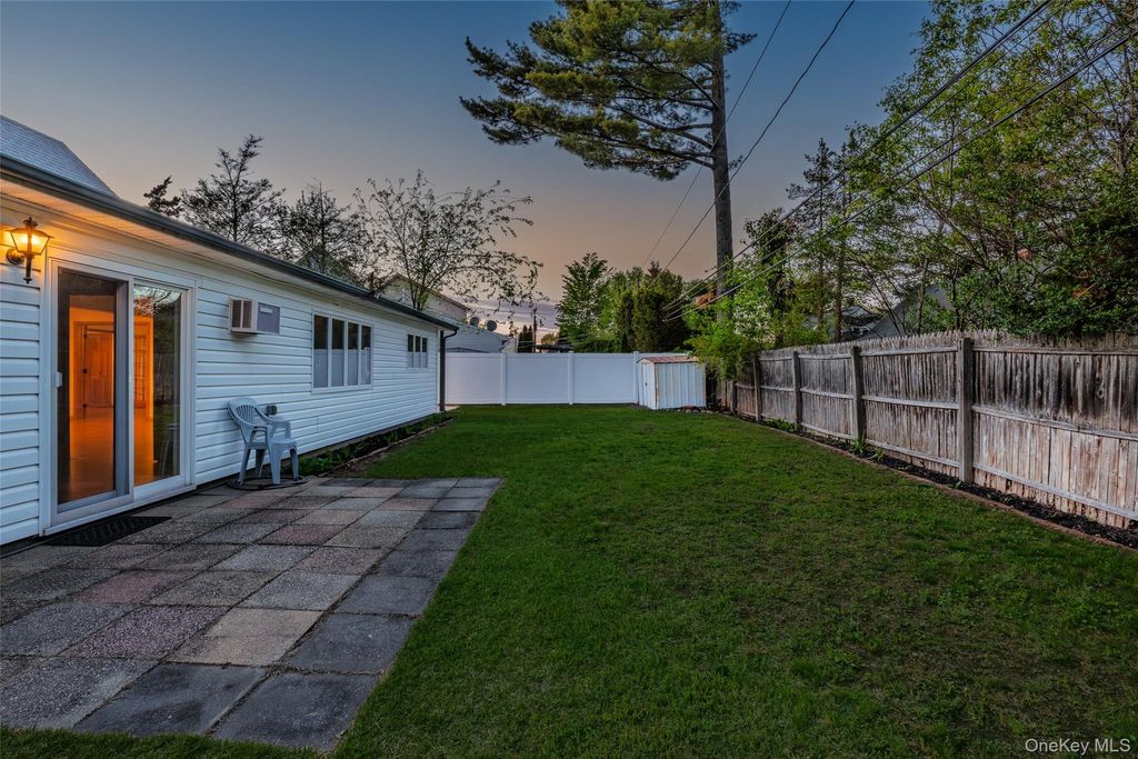 Photo of 19 Palm Lane, Westbury, NY 11590 (MLS # 999765)