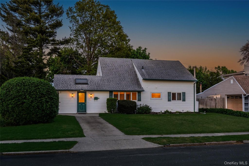 Photo of 19 Palm Lane, Westbury, NY 11590 (MLS # 999765)