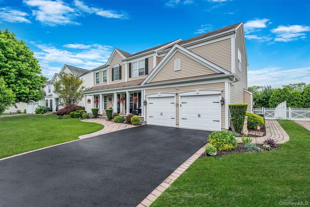 Photo of 11 Woodstork Drive, Mount Sinai, NY 11766 (MLS # 1003218)
