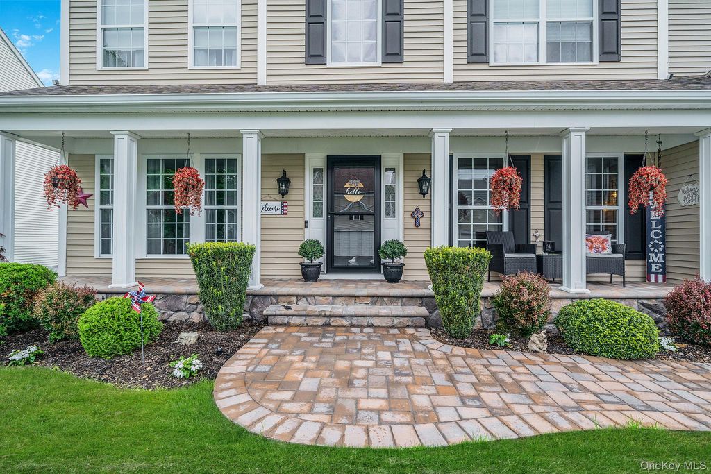 Photo of 11 Woodstork Drive, Mount Sinai, NY 11766 (MLS # 1003218)