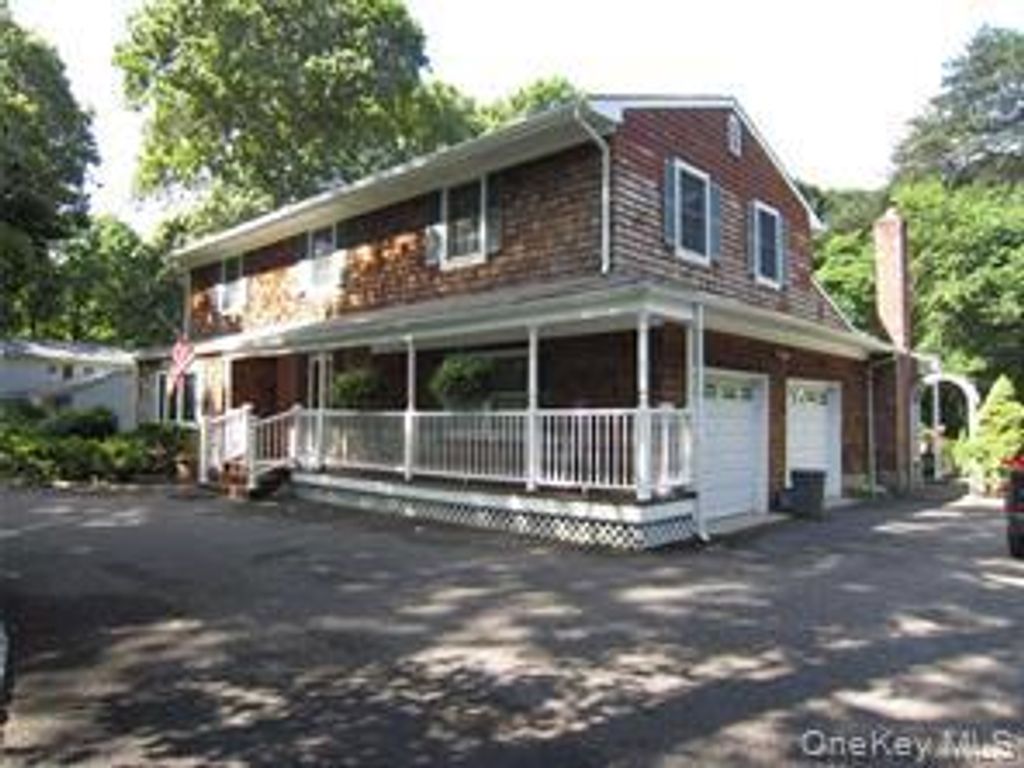 Photo of 36 S Swezeytown Road, Middle Island, NY 11953 (MLS # 988429)