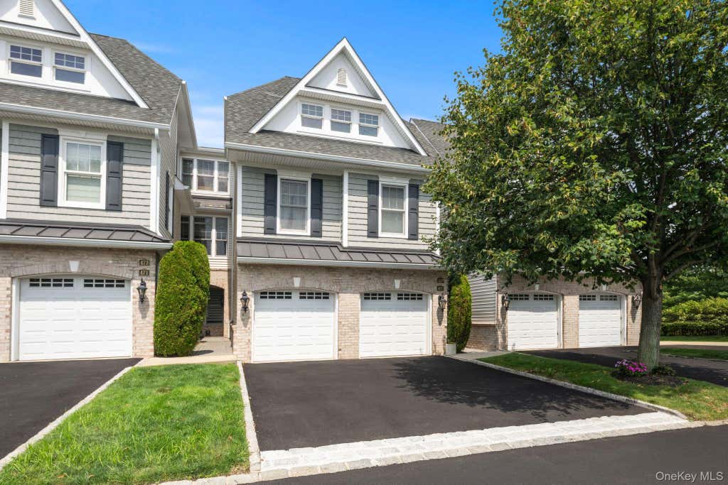 Photo of 469 Pacing Way, Westbury, NY 11590 (MLS # 1040073)