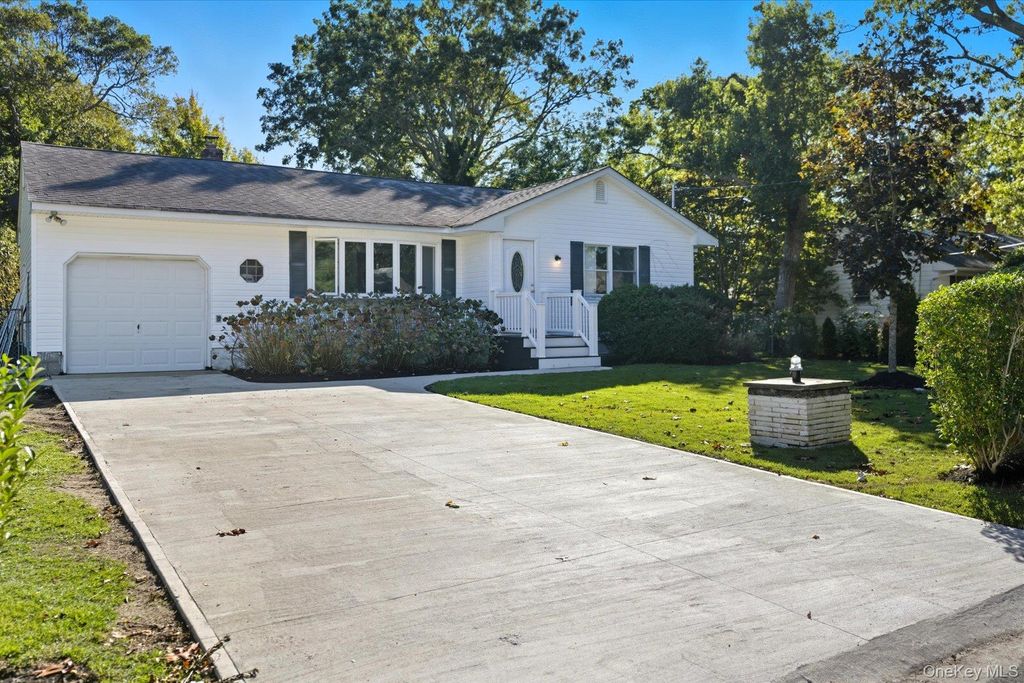Photo of 7 Harvard Drive, Hampton Bays, NY 11946 (MLS # 918369)