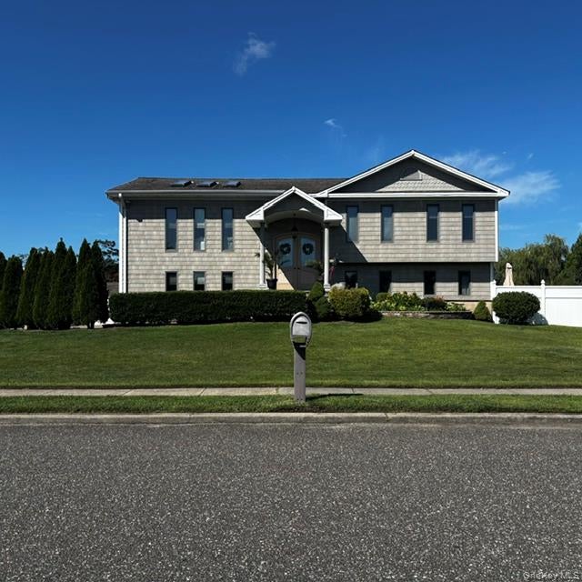 Photo of 70 Gateway Drive, Copiague, NY 11726 (MLS # 1043427)