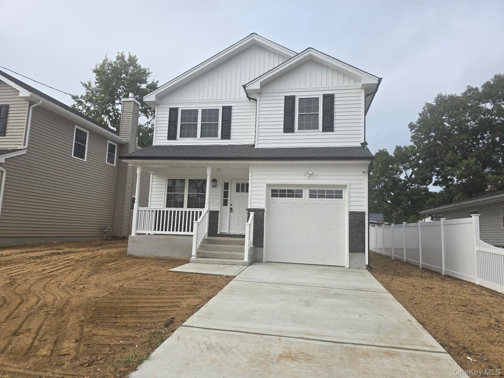 Photo of 127 Frederick Avenue, Roosevelt, NY 11575 (MLS # 1063668)