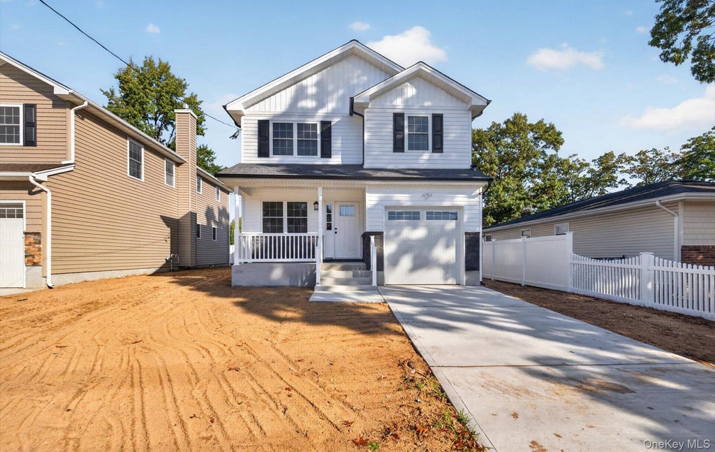 Photo of 127 Frederick Avenue, Roosevelt, NY 11575 (MLS # 1063668)