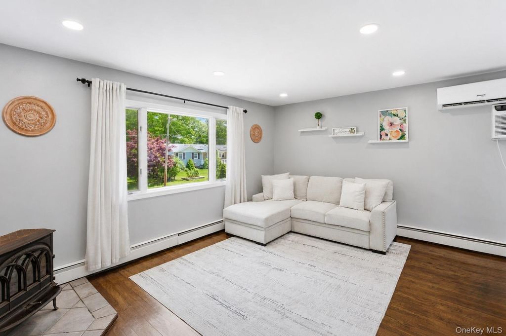 Photo of 82 Seawanhaka Avenue, Nesconset, NY 11767 (MLS # 990573)