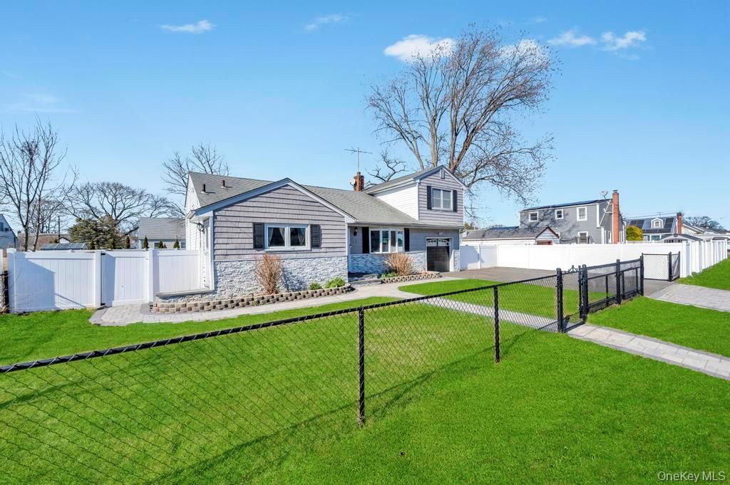 Photo of 221 Cedar Court, Copiague, NY 11726 (MLS # 975038)