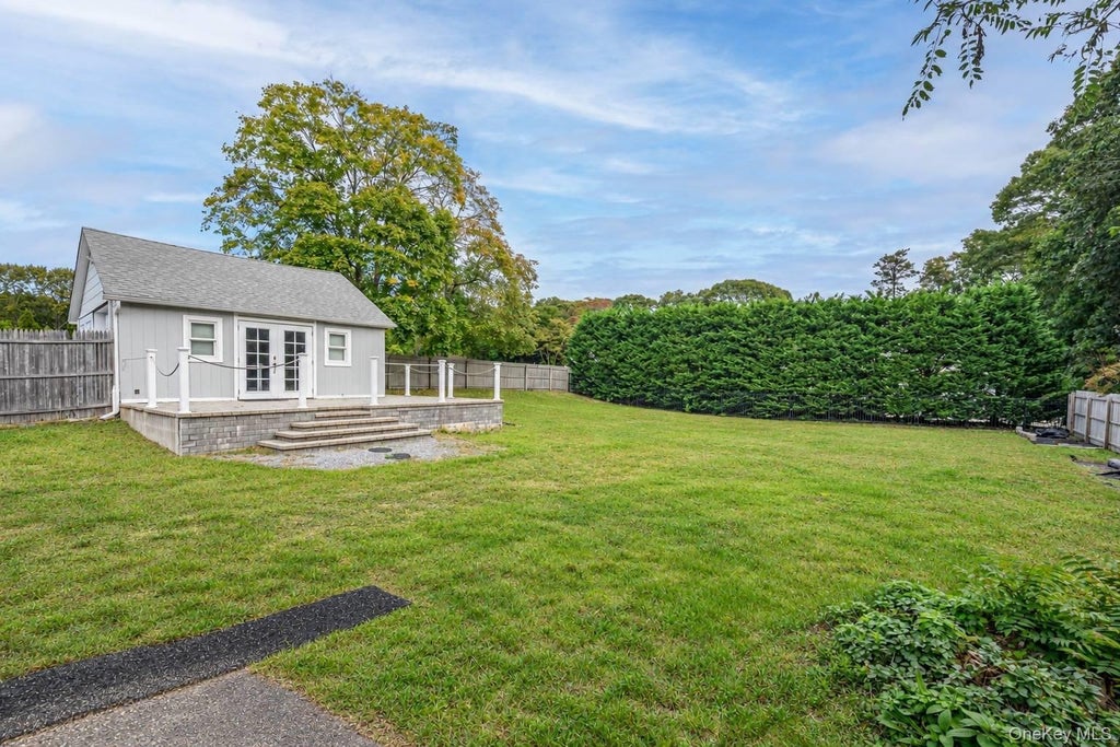 Photo of 16 Squiretown Road, Hampton Bays, NY 11946 (MLS # 1061320)